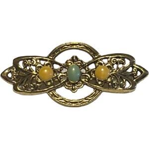 Vintage Gold-Tone Oval Lapel Pin with Trim Elegant 1980s Brooch